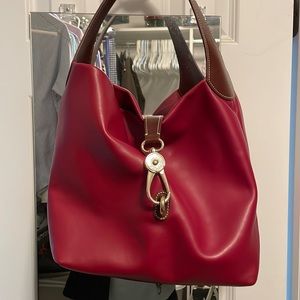 Dooney & Bourke cranberry colored leather bag